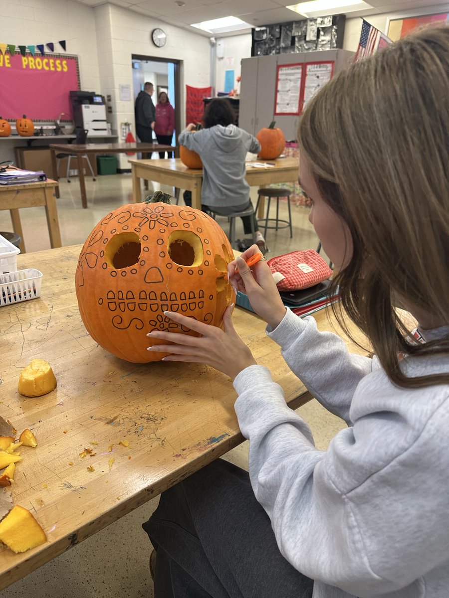 Carving pumpkins in sculpture for the Boone Cty Parks Jack o Lantern Walk.
