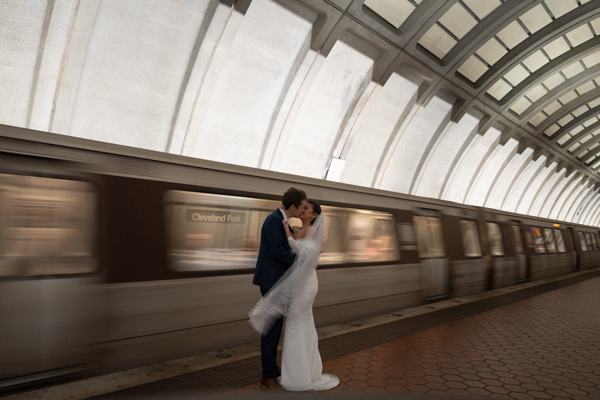 TylerStwart's tweet photo. Did a little wedding @wmata photo shoot, because of course we had to. Made sure to capture our home station too. Shoutout to the train operator that gave us a celebratory honk of the horn!! @wmataGM https://t.co/bLKUV2Ly77