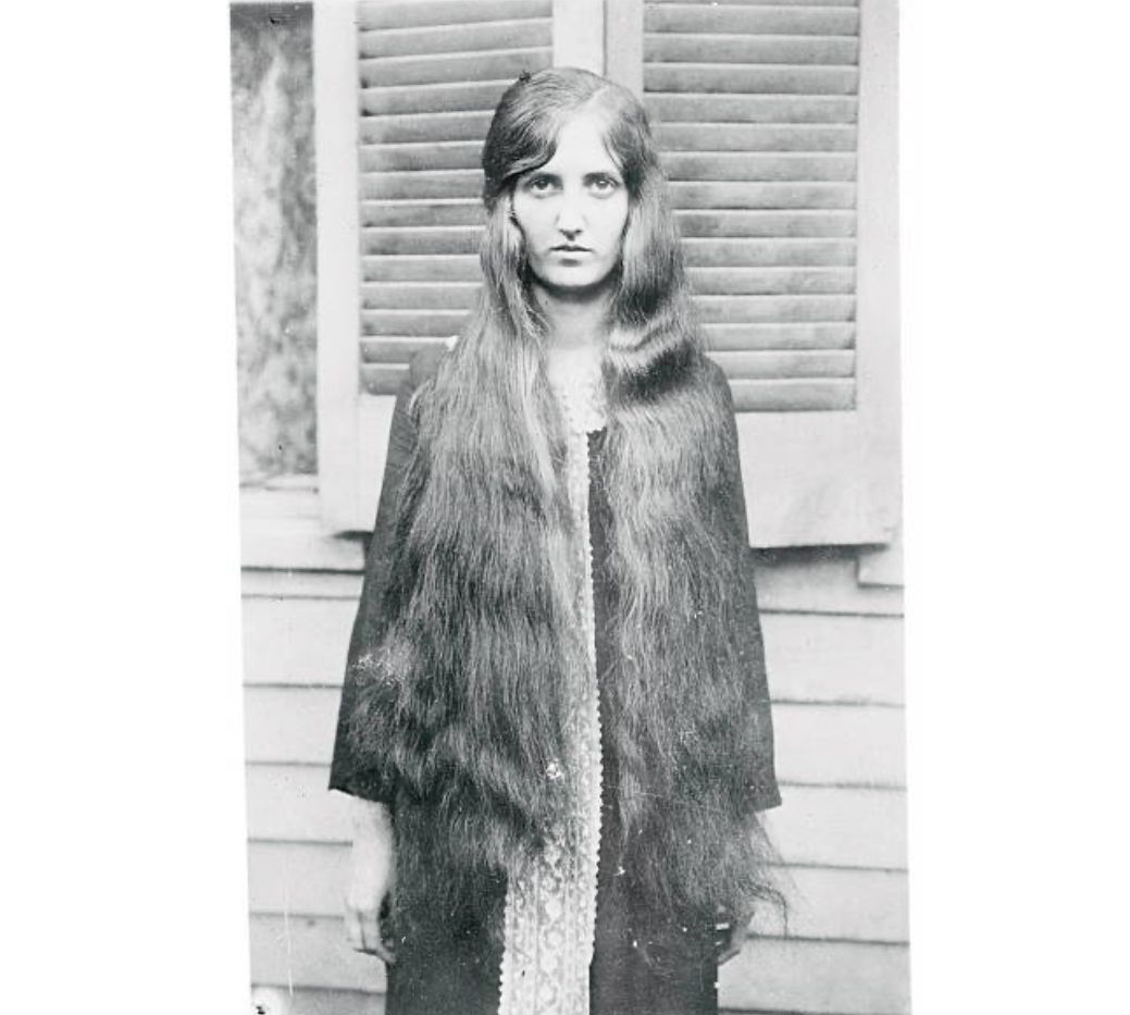 Oct. 23, 1925: Cincinnati schoolgirl Mary Neel Tichener has not merely declined to join the bobbed-hair trend—her hair, reaching all the way to her waist, is declared to be the longest in the city.