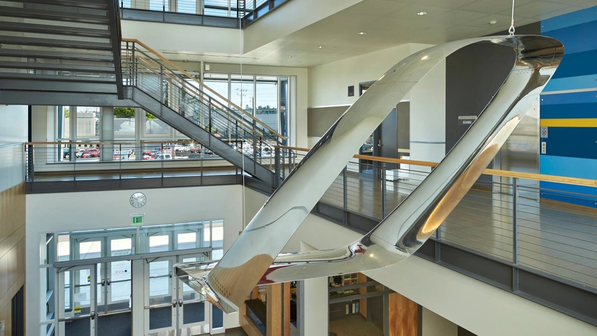 API_Winglets's tweet image. Test flown on the Falcon 50 as a proof-of-concept, this Spiroid Winglet now hangs above the lobby at Raisbeck Aviation High School in Seattle. With its STEM-focused, hands-on learning, RAHS is the perfect place to inspire aviation’s future leaders.

#ThinkWinglets #TBT