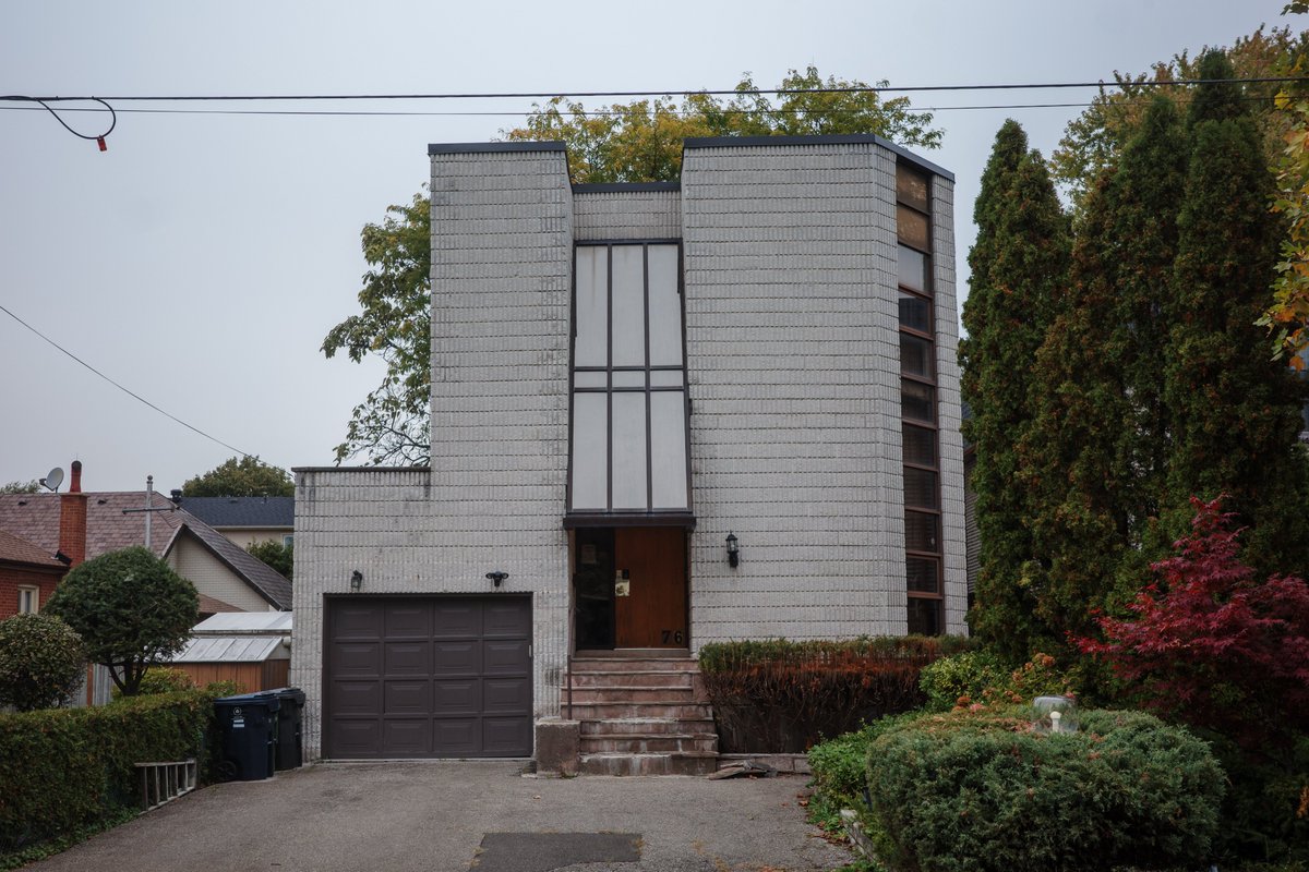 on a quiet crescent in north york, a bold builder decided to defy the character of the surrounding neighbourhood (to be clear, I think this is awesome