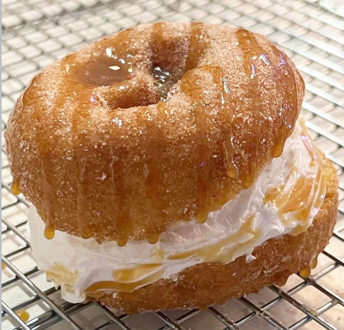 Last Call for Cider Donuts ~ Friday Special 👇🏼
Cider Donut Whoopie Pie 🔥🔥🔥 
~ Our famous Cider cinnamon sugar donut sliced and filled with vanilla buttercream drizzled with caramel sauce. 
We use Beak n Skiff cider to keep the ❤️ local. See you at the shop. Open 7 am - 2 pm