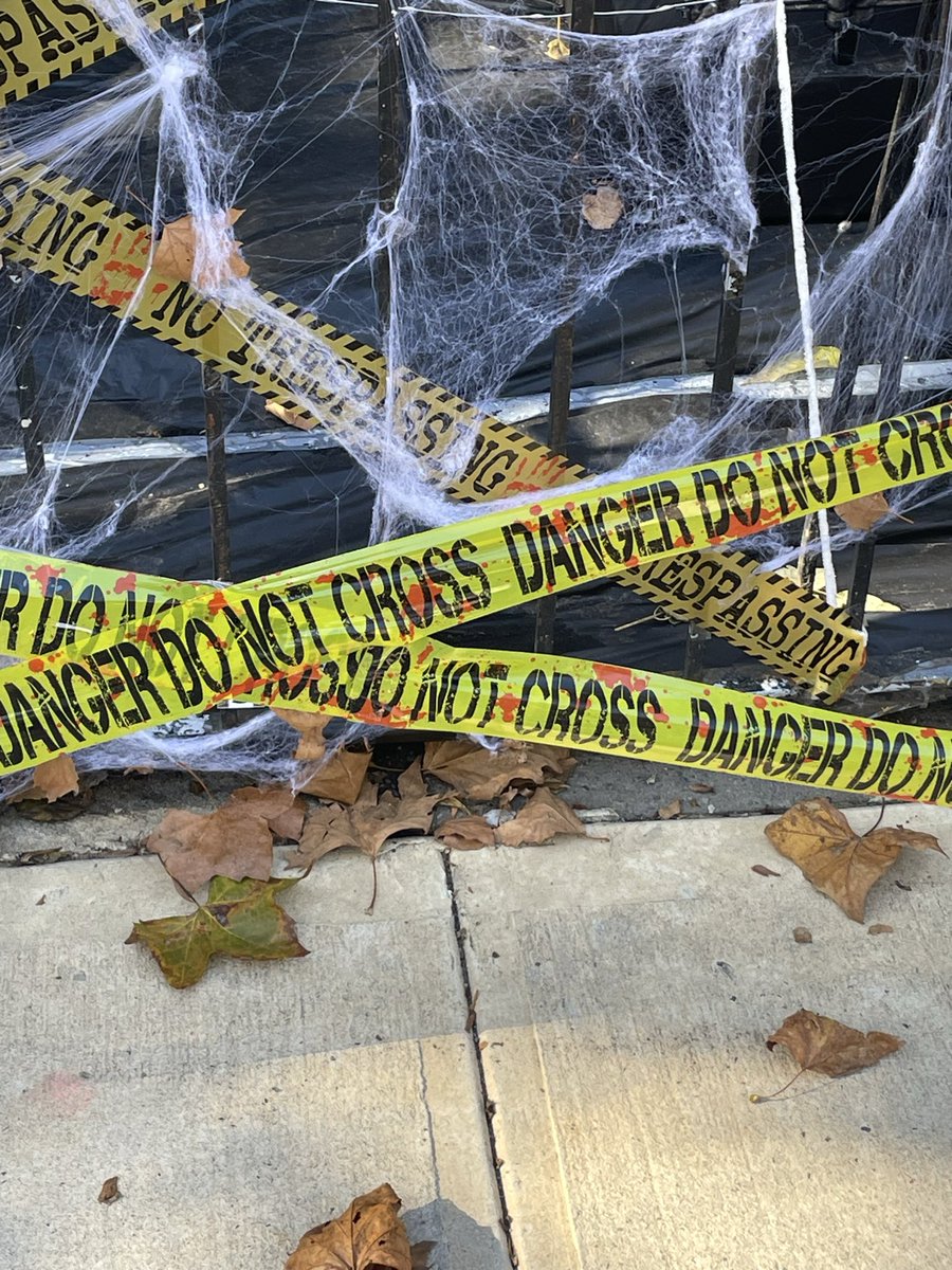 I really enjoy the implication of caution tape spattered with blood. It’s like the the cops were called for an initial murder but in the time since they showed up, even more violent acts have occurred near the original crime scene.