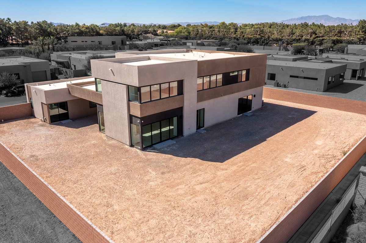 Brand-new Blue Heron home nestled within Oasi, a gated enclave of 24 homes. Set on nearly half an acre with no rear neighbor, it spans 5,888 sq ft with six bedrooms, loft, &amp; a four-car garage equipped with electric car charging hookups. 
⁠
3470 Cosima Lane - Las Vegas, NV USA⁠