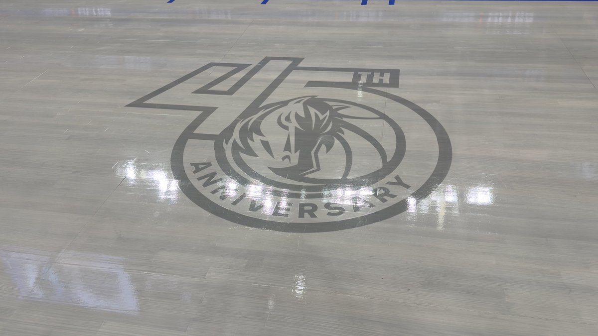 The Mavericks are celebrating their 45th anniversary this season so they’ve placed an on-court decal on the right side of court to commemorate the occasion.

Dirk Nowitzki’s signature fadeaway decal remains on the left side of the court. 