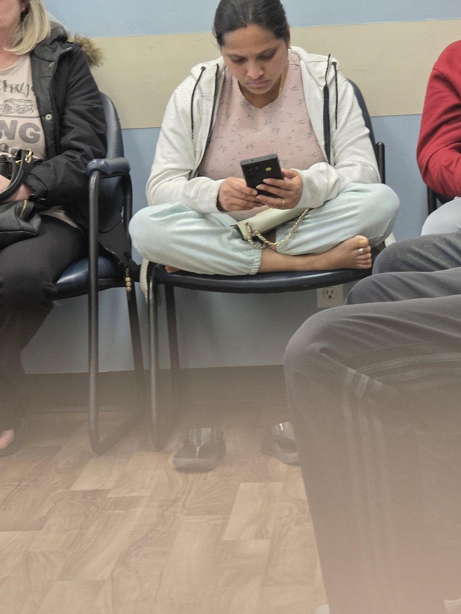 Currently sitting at an AHS lab to get blood work done. You know, a place that's supposed to be sanitary? This woman isn't the only one barefoot here... The dude beside her is also barefoot with one foot on the arm of an occupied chair across from him. So disgusting.