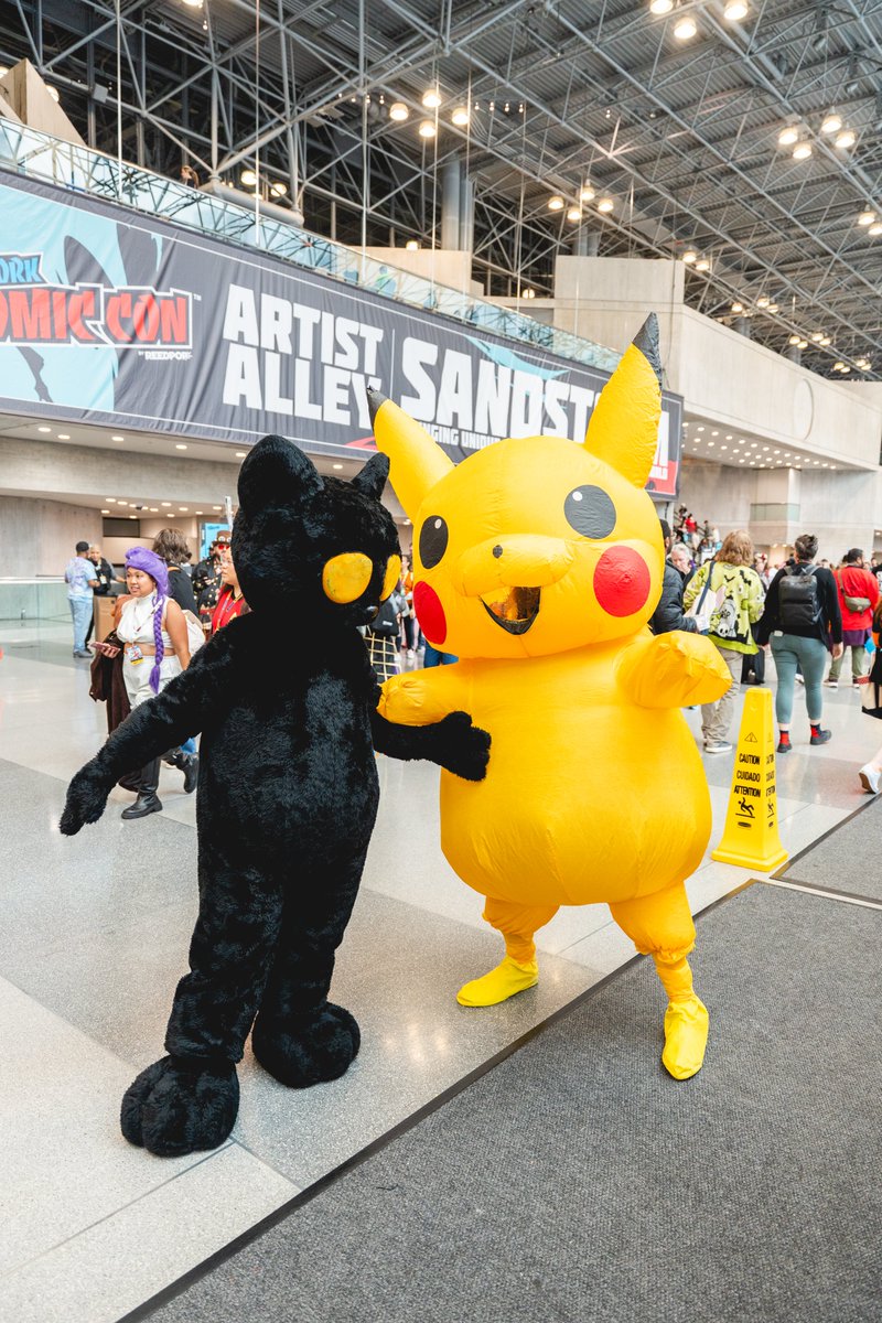 When two universes collide... only at New York Comic Con! 🐈‍⬛⚡️