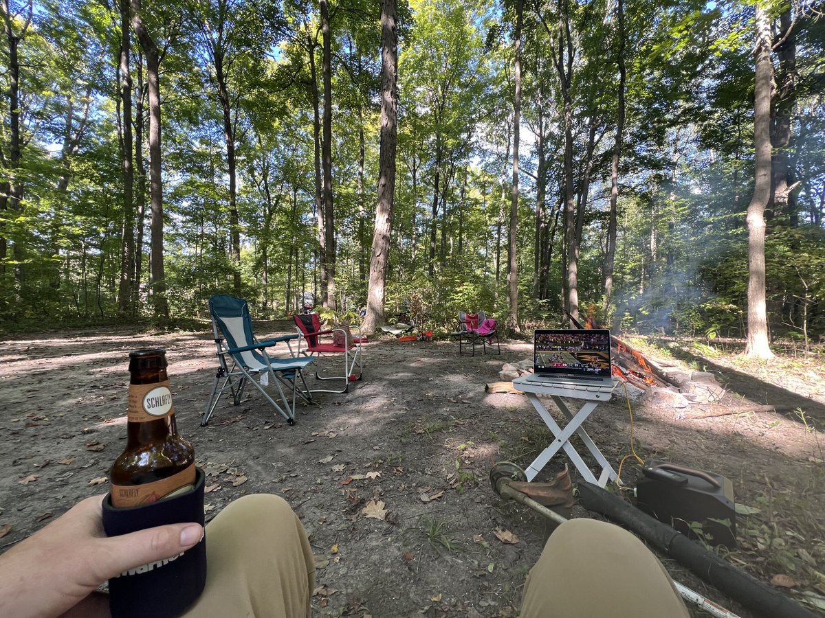 Football watching in the woods, with a fire.  Just as God intended.