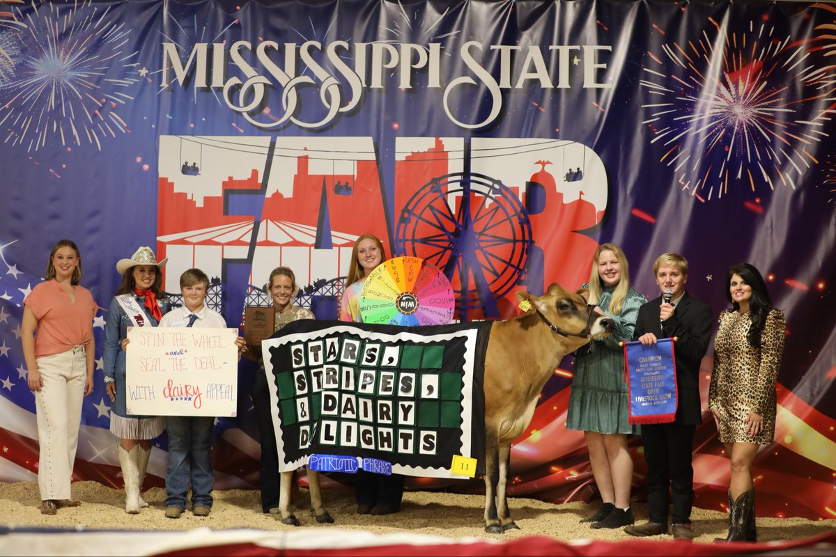 MSStateFair's tweet image. 🎡💐 The Pretty Cow Contest brought Wheel of Fortune fun to the barn! Congrats to Langston Moorman, Susan Babb, Lauren Bryant, Anaston Stevens &amp;amp; Holden Taylor for their creative win with TJF Clue Stella 1695! Huge thanks to judges Christana Kay (WAPT-16 Meteorologist), Sierra…