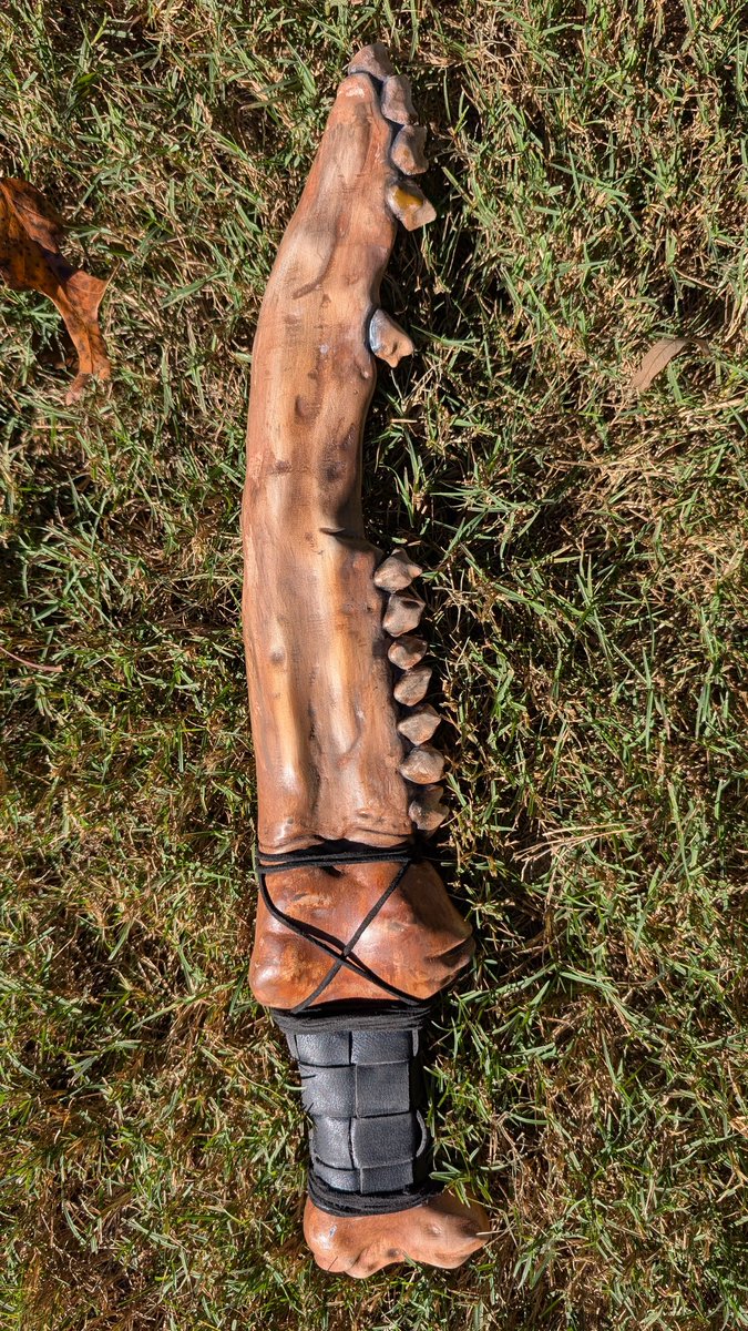 Redid the handle from simple leather cord wrap to leather strips