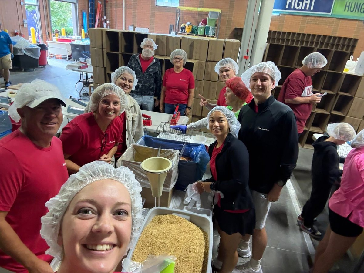 We had a fun team outing this morning spending a couple of hours packing up meals at Meals from the Heartland! We estimate we did roughly 4,600 bags!