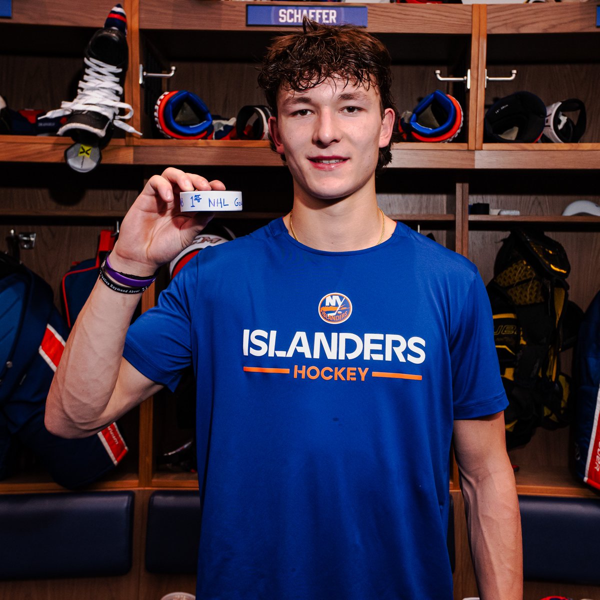 NHL's tweet image. This photo is going on the mantle 🖼️ 

What a day for Matthew Schaefer! #NHLFaceOff