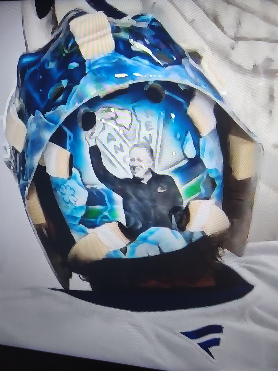 522IntoOvertime's tweet photo. Demko continues with his tradition of tributes to #canucks    legends on the back plate of his mask. 
I'm pretty sure that's Patty's O'Neil, their long time trainer that retired last year. 
@TheStanchion @LachInTheCrease https://t.co/cqmIBZT4uj