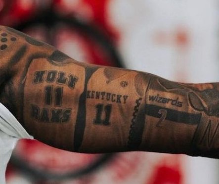 rarerookies's tweet image. John Wall has his Kentucky jersey tatted on his arm.