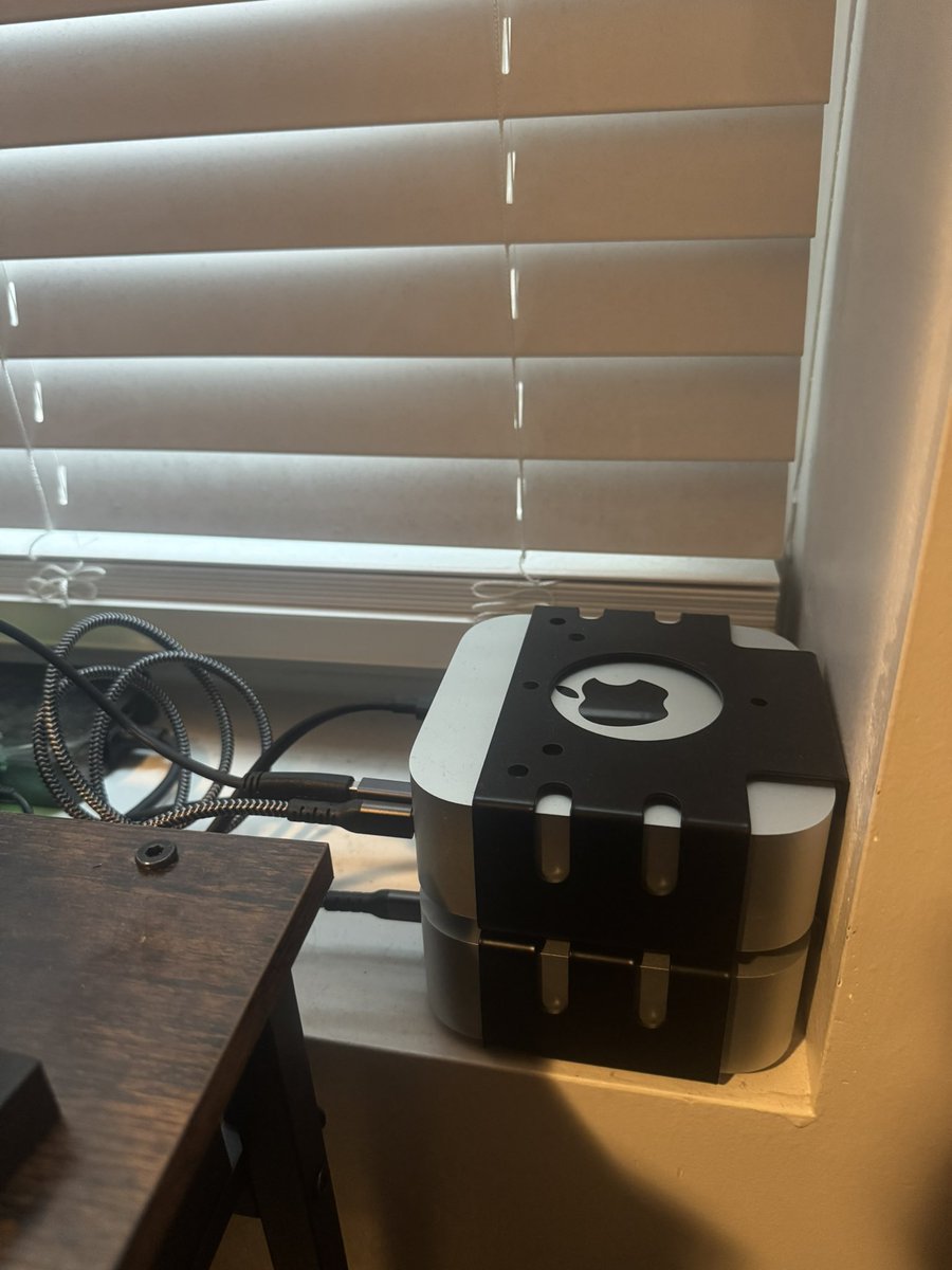 Finally set up my Mac Mini Cluster! Two M4 Minis w/ 16GBs of RAM, 10 Cores &amp; 256GB of SSD Storage (per node) connected to a 20TB EHD. Using Thunderbolt 4 for Node Connection and TailScale for SSH Access from anywhere. All-In Cost was ~$1,050. Going to build some tools on it!