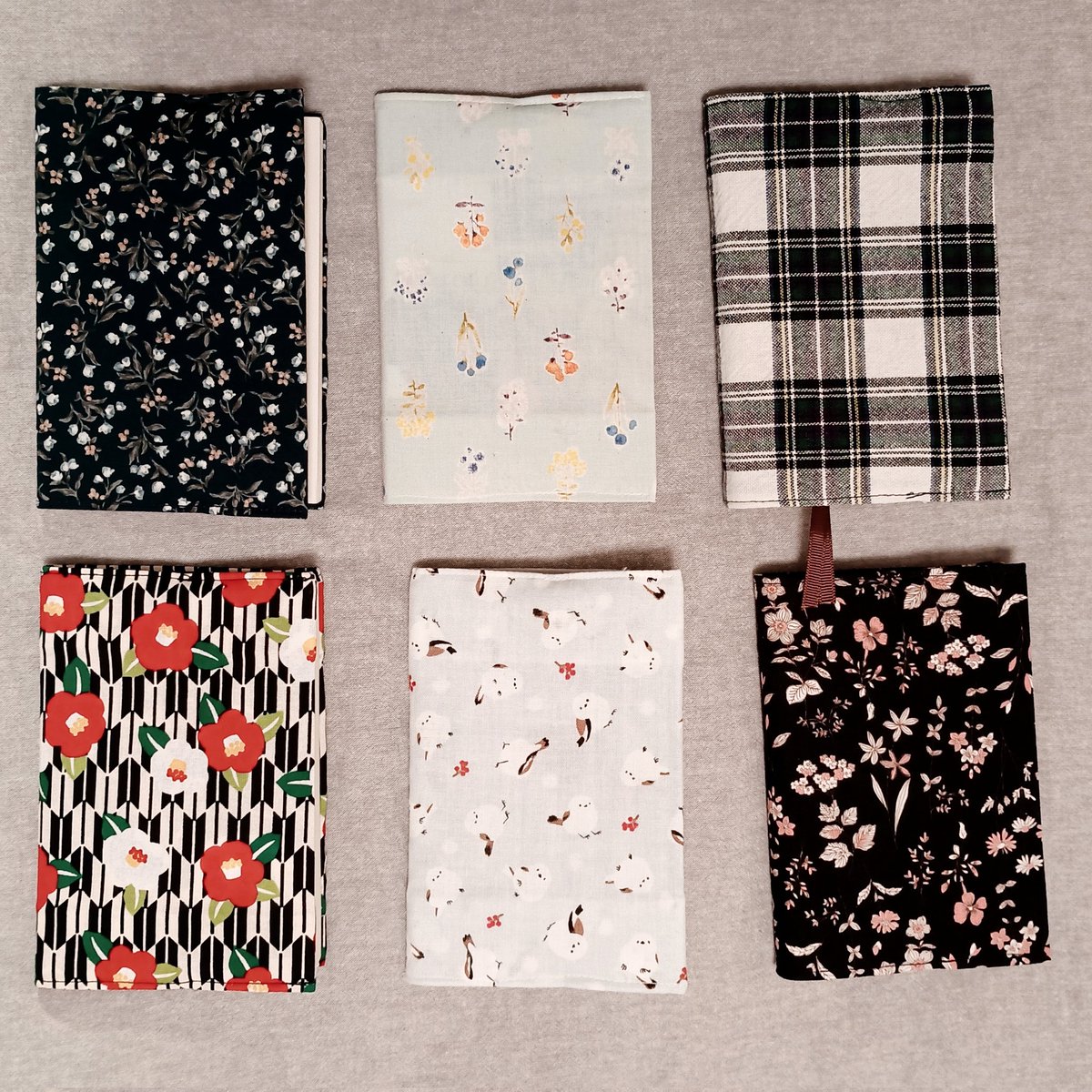 たまに100円ショップのハギレ使って縫ってるブックカバー　可愛いハギレ見つけると買ってしまう…