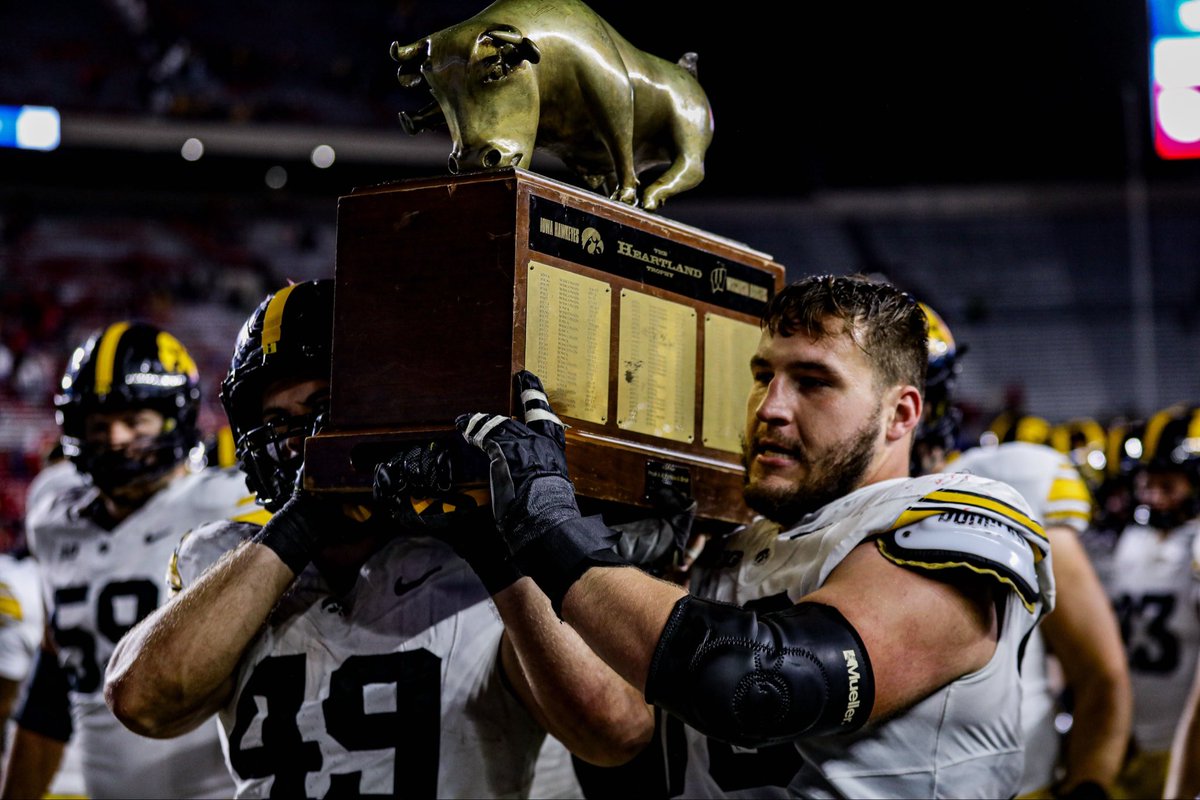 B1Gfootball's tweet photo. The Heartland Trophy is going back to Iowa City 🏆 https://t.co/OEtmpquSPY