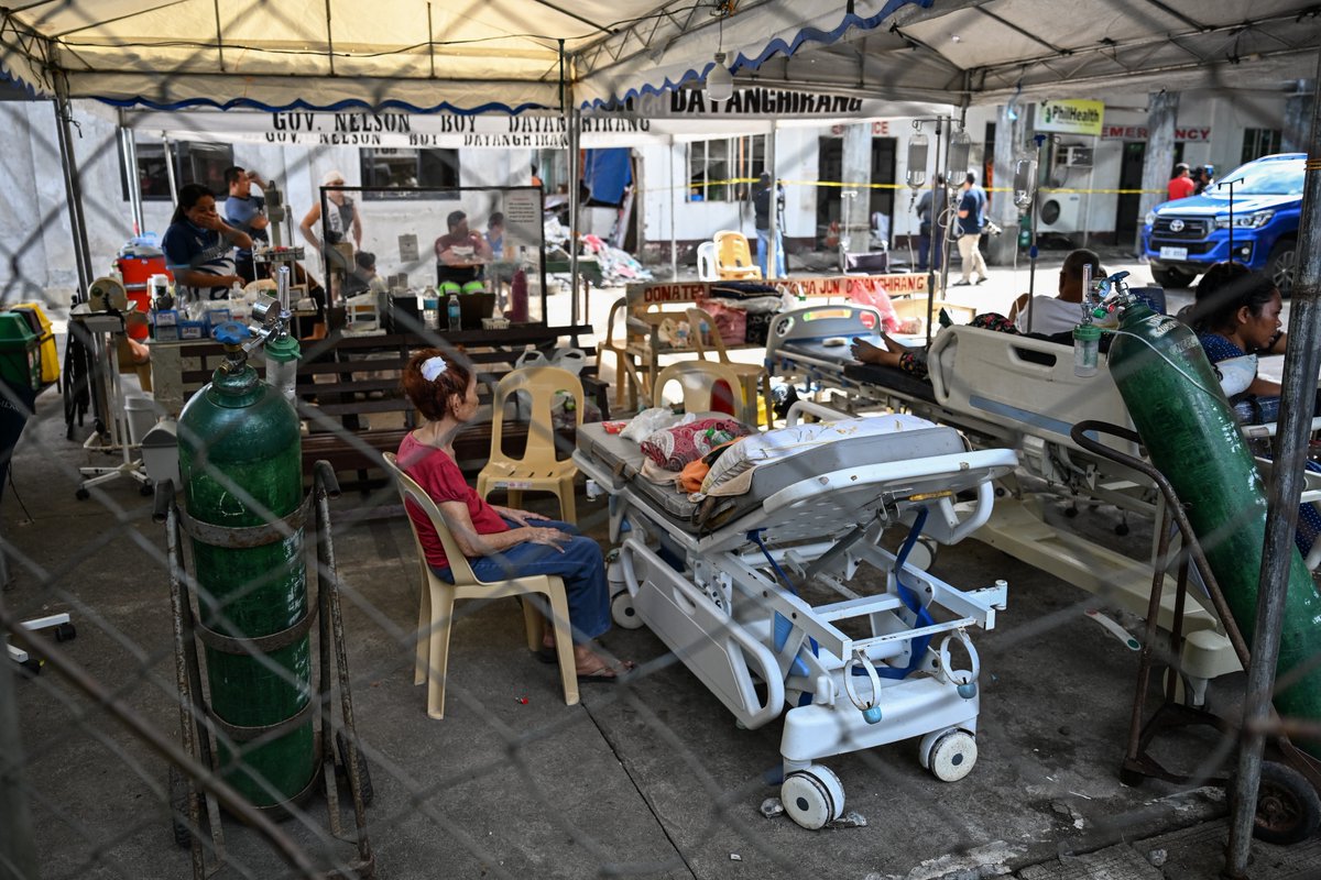 inquirerdotnet's tweet image. LOOK: Patients wait outside a damaged hospital in Manay, Davao Oriental, after two powerful earthquakes struck off the province on Friday, Oct. 10, killing at least eight people and triggering tsunami warnings that were later lifted. | 📷: Jam Sta. Rosa/AFP

•⁠ ⁠Follow live…