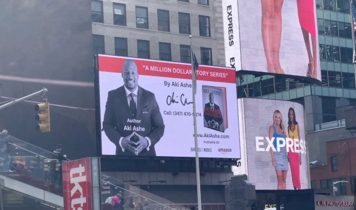 AkiAshe's tweet photo. Aki Ashe, author, businessman, and philanthropist, makes it to a billboard in New York Times Square with his first book “The Power of Dressing.”  The book has been inspired from his grandmother and the vision he had for her grandson. 

The Ashe Syndicate https://t.co/nI1btMtENY