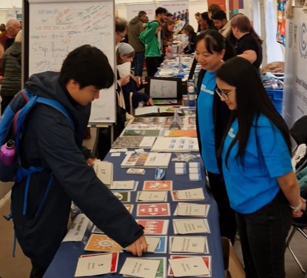 .<a href="/UNVolunteers/">UN Volunteers</a> brought spirit of volunteering #UNDay #Bonn with games, quizzes and 100s of conversations sparking curiosity. We're the UN's best-kept secret, as we were told. So how do we change that? Keep showing up, sharing our stories &amp; it's OK once in a while to pose🎉