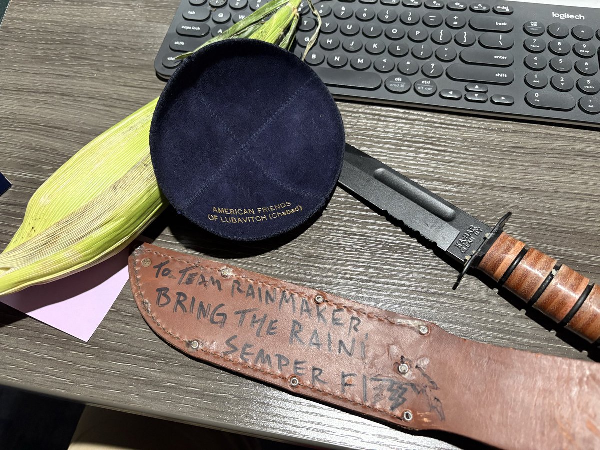 ADoricko's tweet image. Thank you to the mysterious man that delivered these 3 gifts to my office while I was out
I am bewildered by and grateful for the USMC Ka-Bar, Chabad Lubavich kippah, and husk of corn