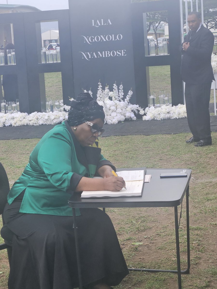 GCISMedia's tweet image. Dr Nkosazana Dlamini-Zuma writing a message of condolence to the family of the late Ambassafor to France #NathiMthethwa