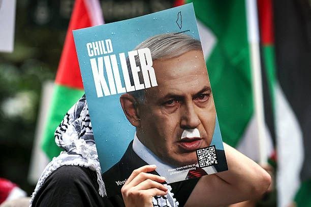 QudsNen's tweet photo. Massive crowds marched on Sunday in Sydney, Australia, in solidarity with the people of Gaza after two years of Israeli genocide. https://t.co/hQPILLcDY5