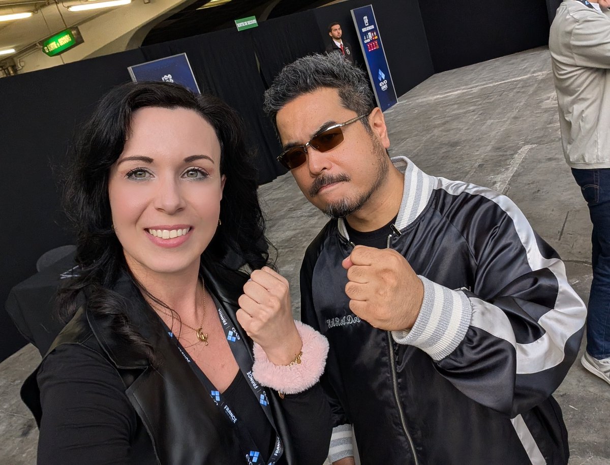 I couldn't believe it I found <a href="/Harada_TEKKEN/">Katsuhiro Harada</a> in the crowd! So happy to have met you! 🔥✨💪🏻
Enjoy your stay in Italy  this month! 🇮🇹 

#EvoFrance2025