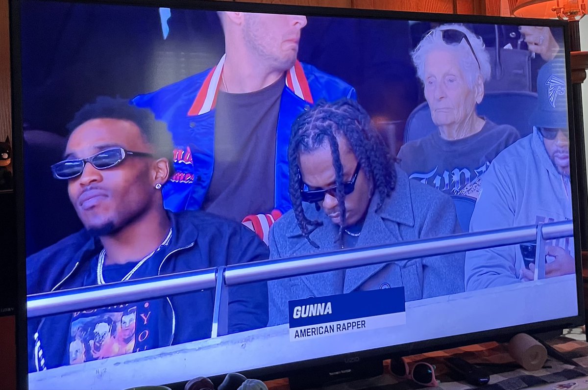 SpaceLordMM's tweet photo. @NFL @nflnetwork the woman with the Tupac shirt and her grandson, Ross Smith are a famous TikTok duo. #fyi https://t.co/uFtYOJs9e8