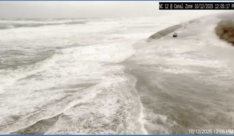 EthanClarkWX's tweet image. Highway 12 is completely underwater just south of Oregon Inlet. It is not passable as the ocean has flooded the road, yet cars continue to drive around the barricades. DO NOT endanger yourself or first responders. Wonder if the road will even still be there at low tide. #ncwx