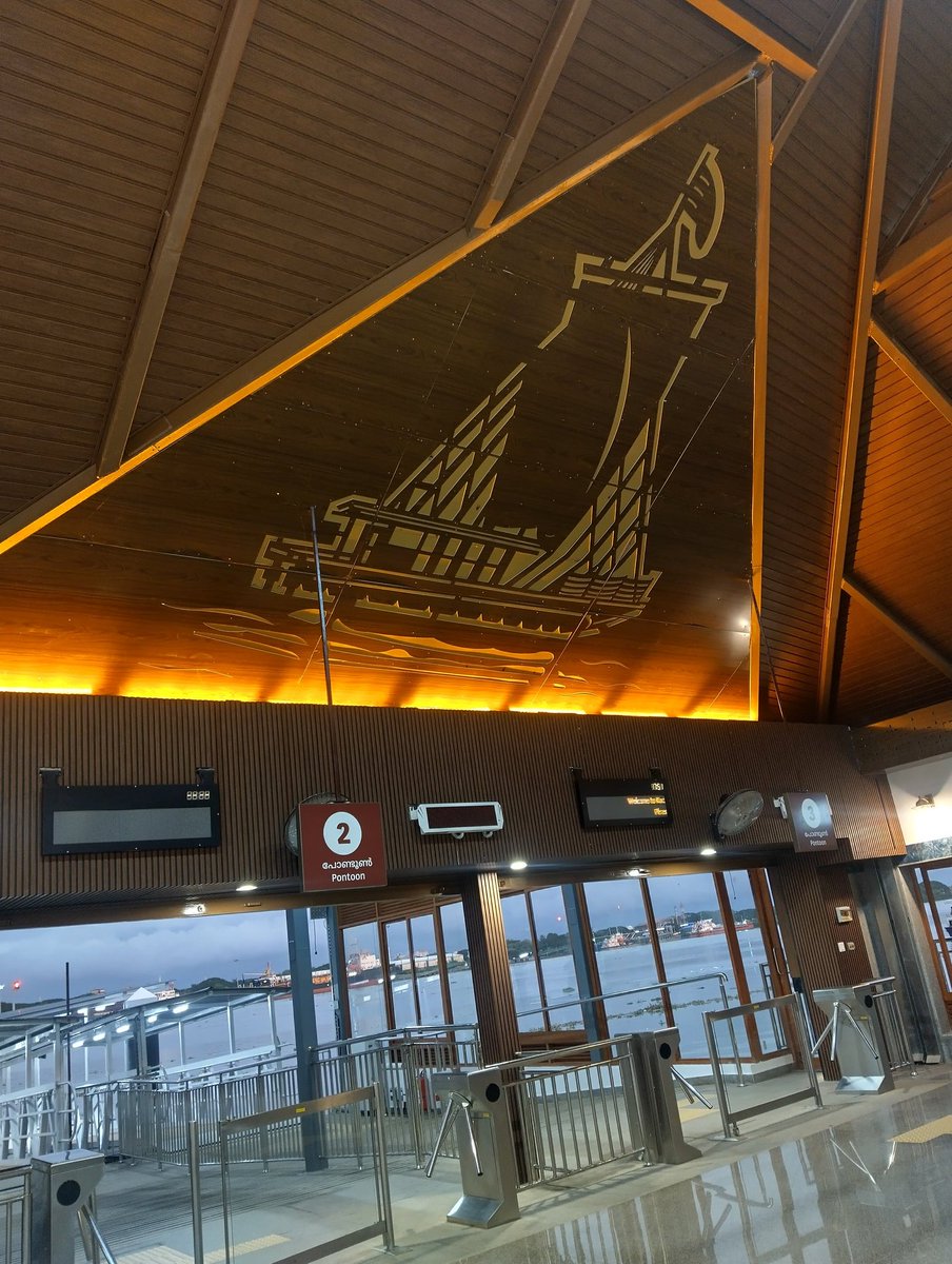 appooz's tweet photo. The teak in-lays add a great artistic touch to Mattancherry Water Metro Station. Among the best stations I've seen. The stilt design also helps navigate the low tide problem. And it's bang opposite the Pazhayannur Temple inside the Dutch Palace adjacent the Jew Town. https://t.co/UwGKNbq0vT
