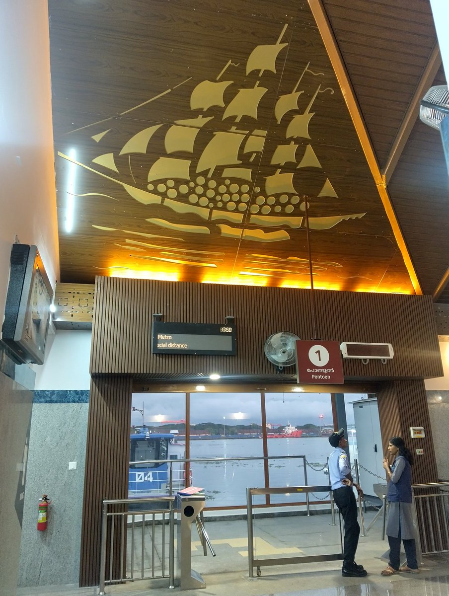 appooz's tweet photo. The teak in-lays add a great artistic touch to Mattancherry Water Metro Station. Among the best stations I've seen. The stilt design also helps navigate the low tide problem. And it's bang opposite the Pazhayannur Temple inside the Dutch Palace adjacent the Jew Town. https://t.co/UwGKNbq0vT