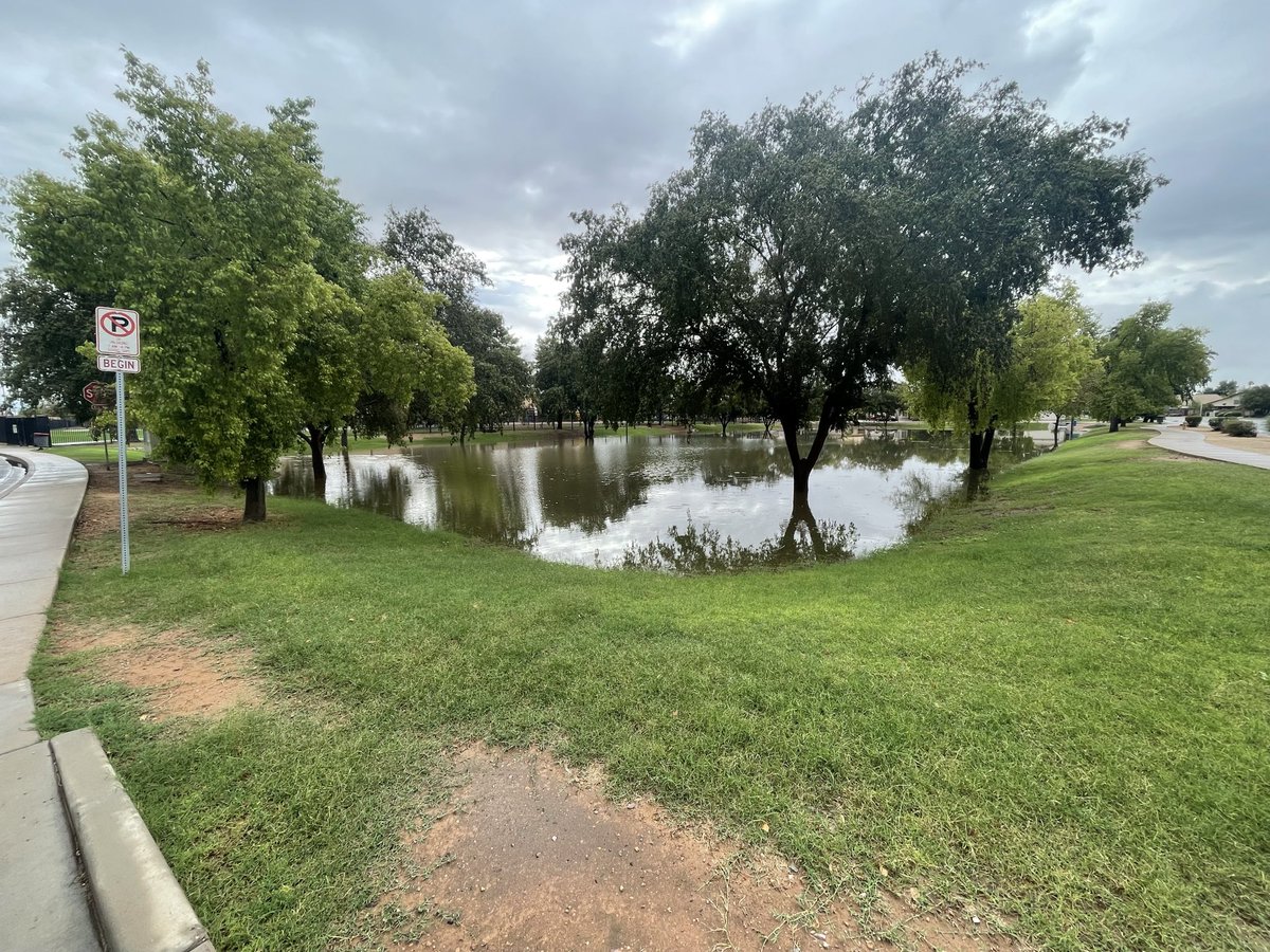 usrbinsean's tweet image. Suburban retention basins can seem like a waste of space, but when the remnants of a hurricane come through, they can be pretty handy and attractive. 

Note that the 24 inch drain pipe is nearly covered.
