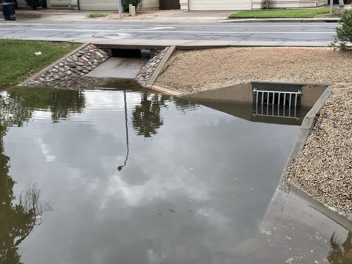 usrbinsean's tweet image. Suburban retention basins can seem like a waste of space, but when the remnants of a hurricane come through, they can be pretty handy and attractive. 

Note that the 24 inch drain pipe is nearly covered.