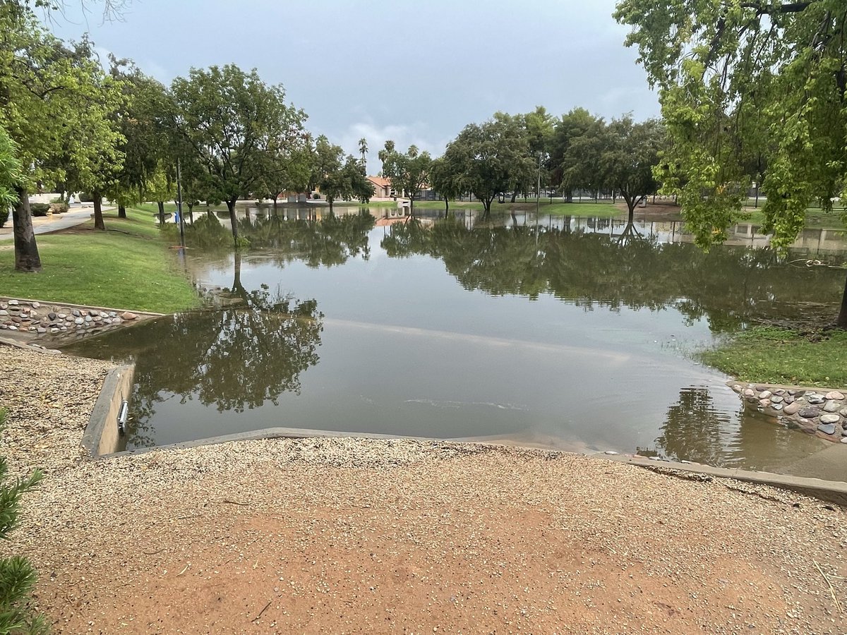 usrbinsean's tweet image. Suburban retention basins can seem like a waste of space, but when the remnants of a hurricane come through, they can be pretty handy and attractive. 

Note that the 24 inch drain pipe is nearly covered.