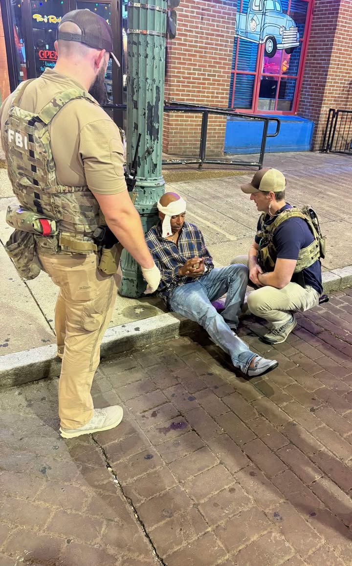 toddstarnes's tweet photo. One of my radio show listeners snapped this photo on Beale Street in Memphis. FBI agents rendering first aid to a gentleman who had fallen. The media won't report this. We are so grateful that President Trump sent federal law enforcement to our city.  Thank you, @AGPamBondi @FBIDirectorKash @FBIDDBongino