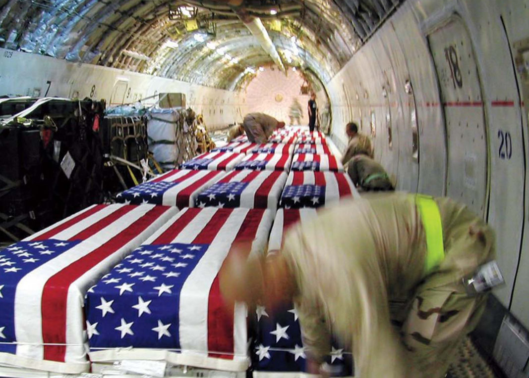 historyslides's tweet image. KIA troops coming home from Iraq 2004