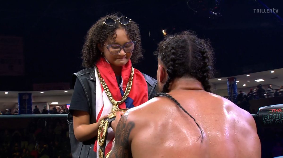 SeanRossSapp's tweet image. Mike Santana is TNA Champion and hands the championship to his daughter. Lovely moment
