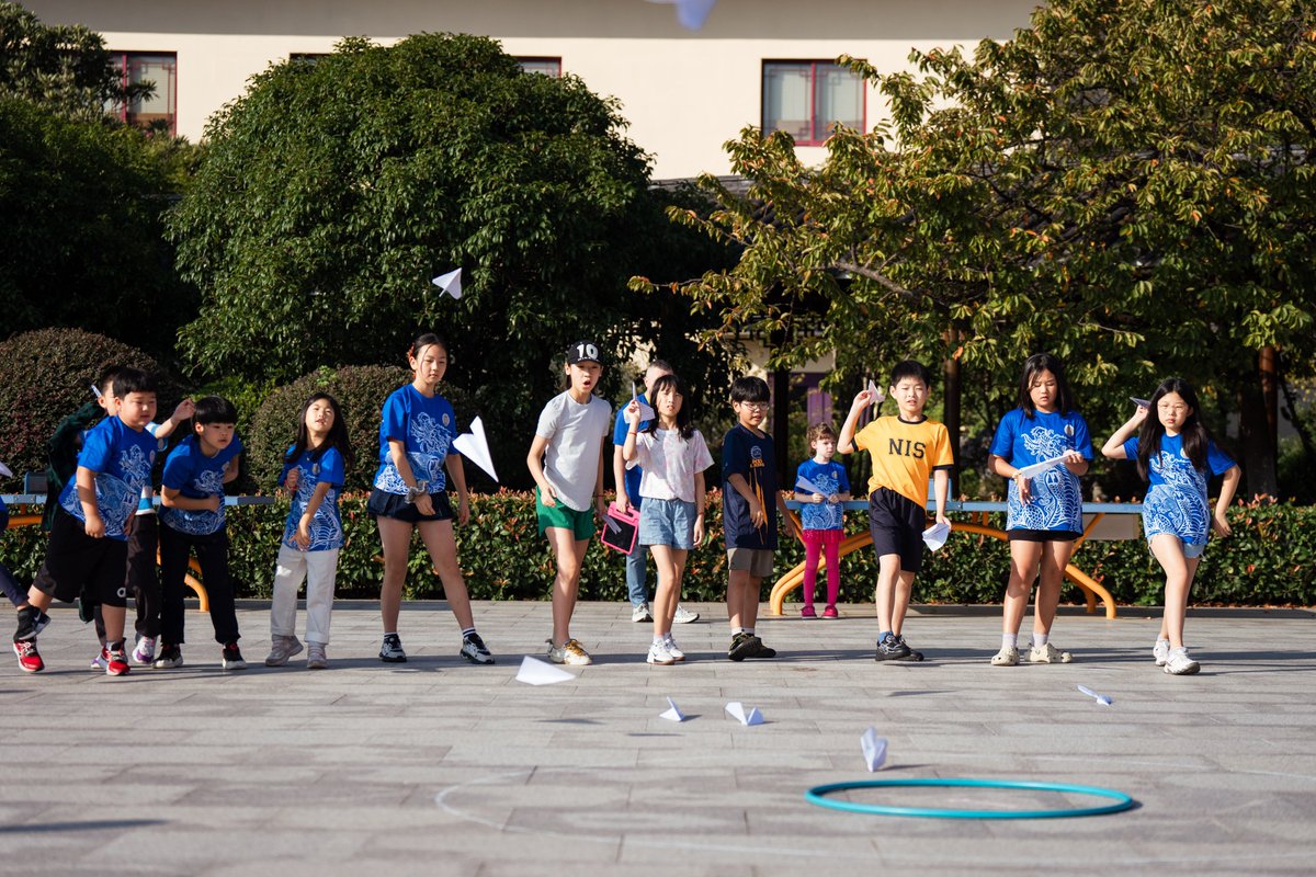 Primary students teamed up across grades for our first mixed-age House Event – the Paper Airplane Challenge! Together they explored design, aerodynamics, and flight, all while building creativity, teamwork, and a stronger community. nischina.org/news/article/~… #NISInspires