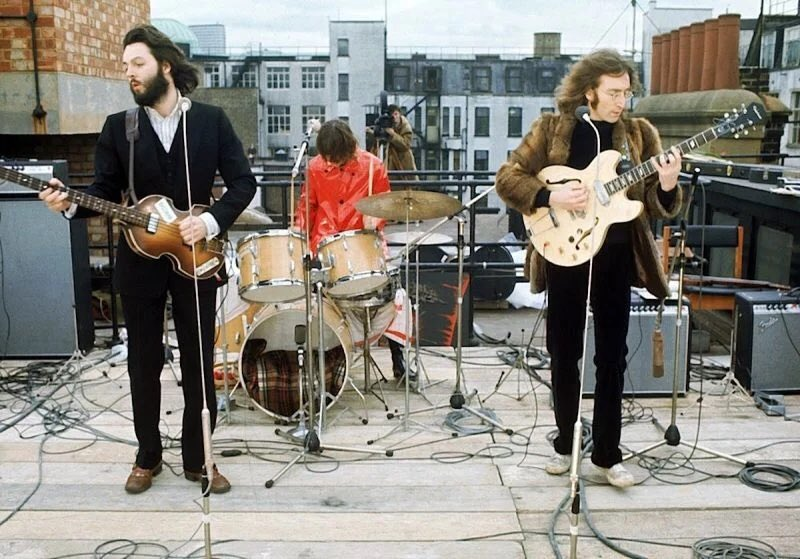 The Beatles perform live in London, England on January 30, 1969