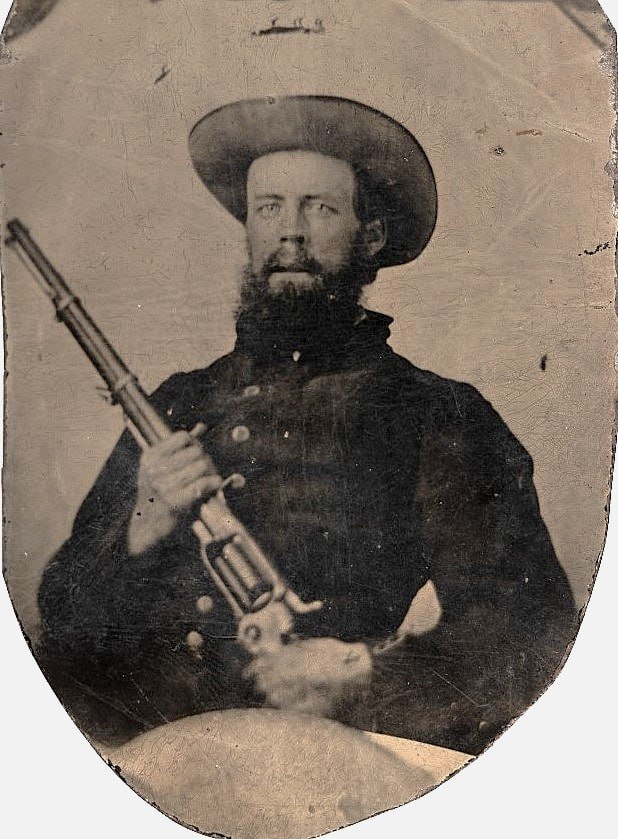 Bigfoot_Victim's tweet photo. Corporal John A. Gibbs, Company C (“Mecklenburg’s Wide Awakes”), 37th Regiment N.C. Troops.

Gibbs is shown holding an uncommon weapon, the “Artillery Model” of the Colt Model 1855 Revolving Carbine, caliber .56 https://t.co/PsXhXcTjoN