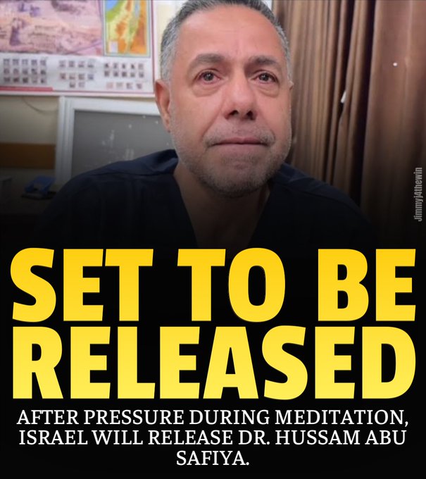 A middle-aged man with gray hair and beard wearing a dark shirt sits in front of a patterned curtain and a map on the wall behind him, looking directly at the camera with a serious expression. Bold yellow text overlay reads SET TO BE RELEASED in large letters at the top, followed by After Pressure During Mediation, Israel Will Release Dr. Hussam Abu Safiya. in white text on a black background at the bottom.