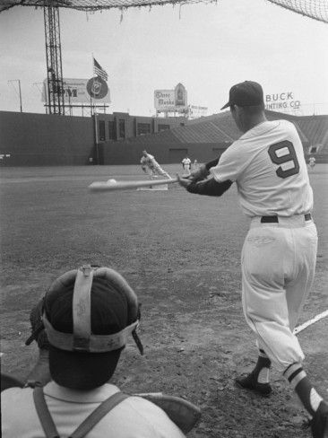 Ted Williams taking batting practice at Fenway Park.