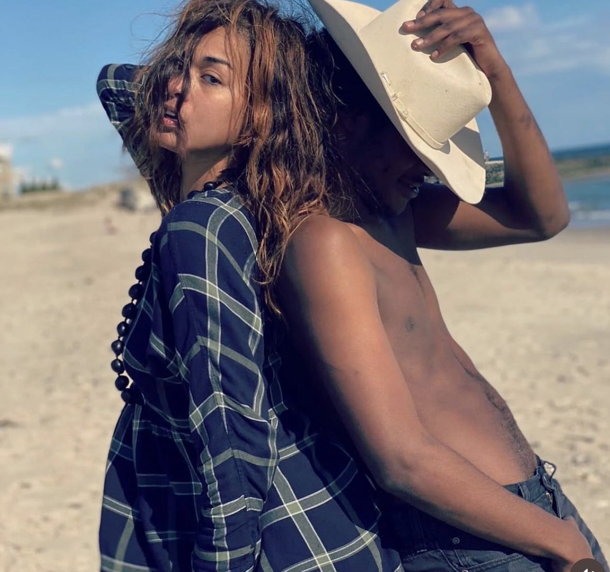 This one’s for ⁦<a href="/iloveurcostume/">bree</a>⁩ who always sends me the sweetest messages. That’s me on the beach with a boy who stole my Stetson :shot by Marc Baptiste in the Hamptons: xoxo 💋