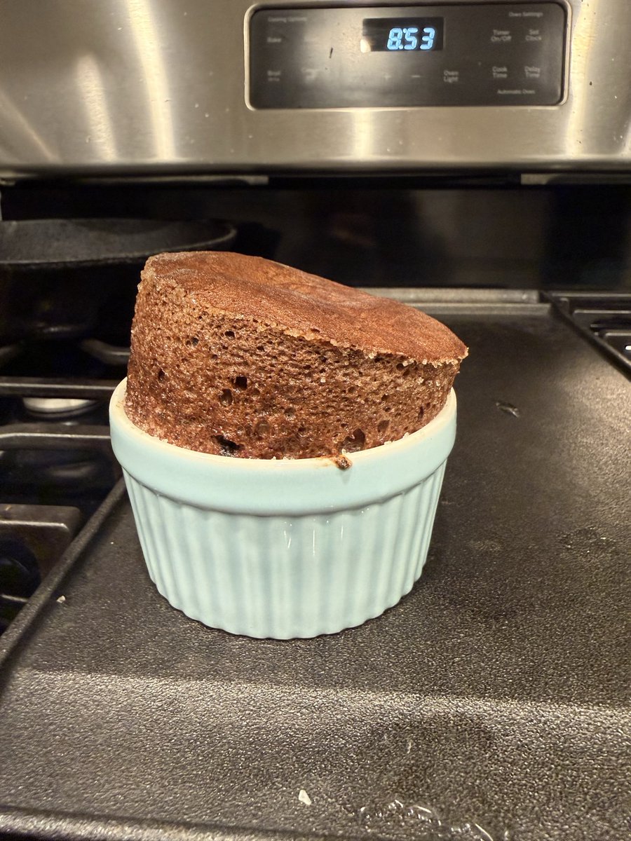 Fist time making a chocolate soufflé. It came out pretty good except for leaning a bit