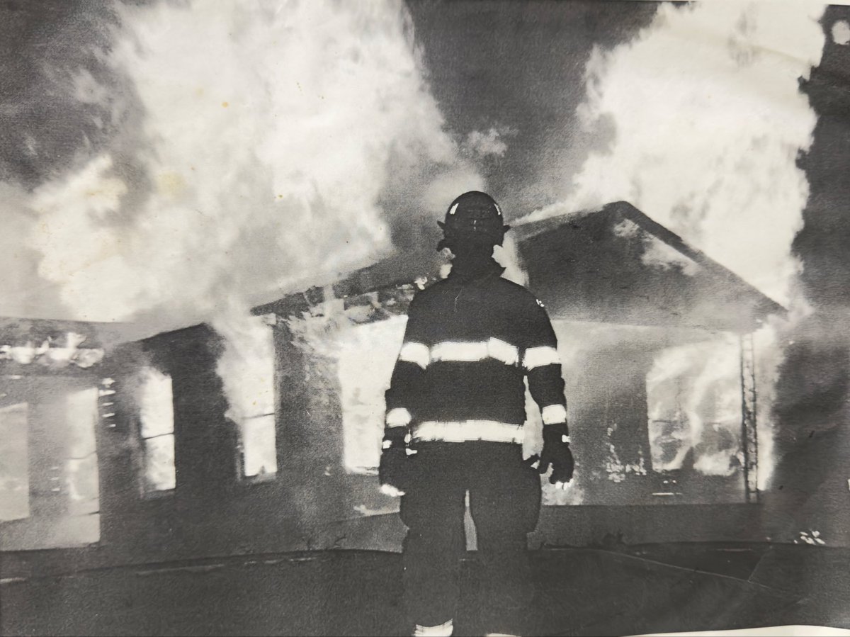 AtiLvmhe's tweet photo. Found an old photo from a training burn that was done about a decade ago.   I tried using AI to convert the B&amp;W image to color, but the AI decided the flames should be blue.   🤷‍♂️ https://t.co/64iR140YW8