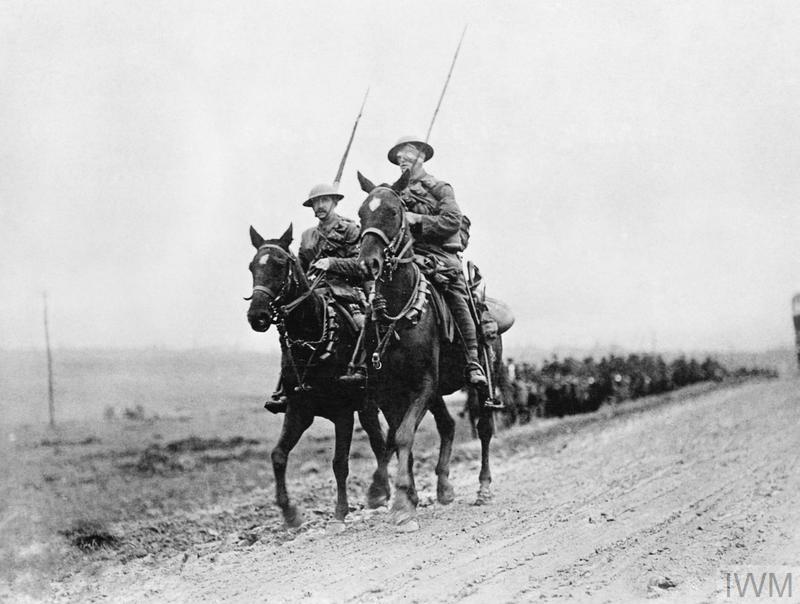 British 9th Lancers returning from the front at Premont, 13 October 1918.© IWM Q 72605