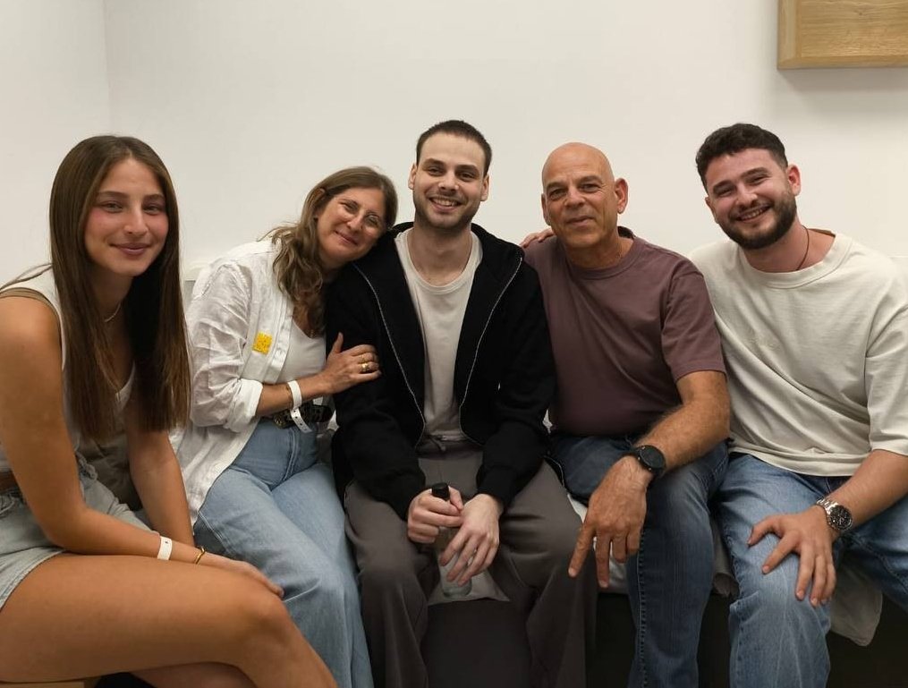 Alon is with his family.