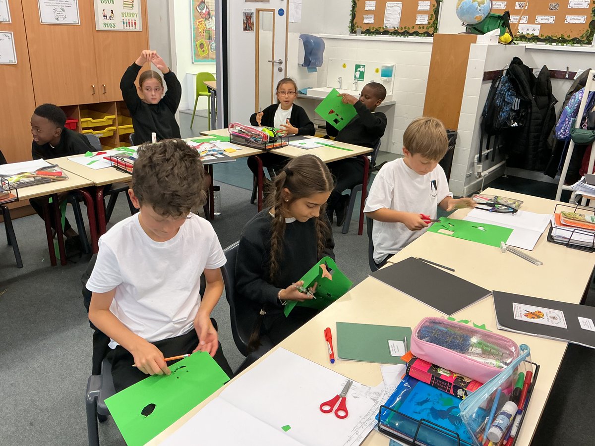SCOS_Andrew's tweet photo. Creating stencils for our installation Art #StCathsArt https://t.co/CkkFJE5qaX