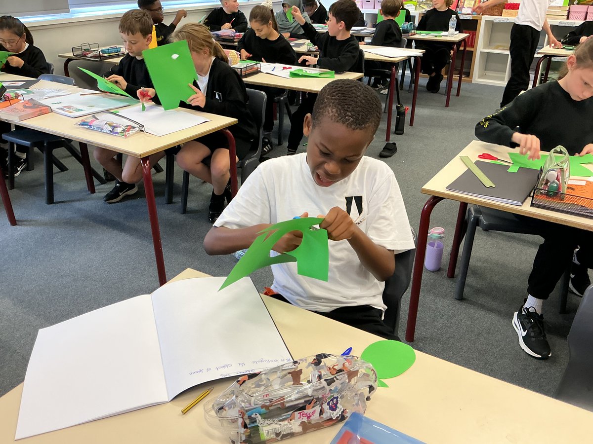 SCOS_Andrew's tweet photo. Creating stencils for our installation Art #StCathsArt https://t.co/CkkFJE5qaX